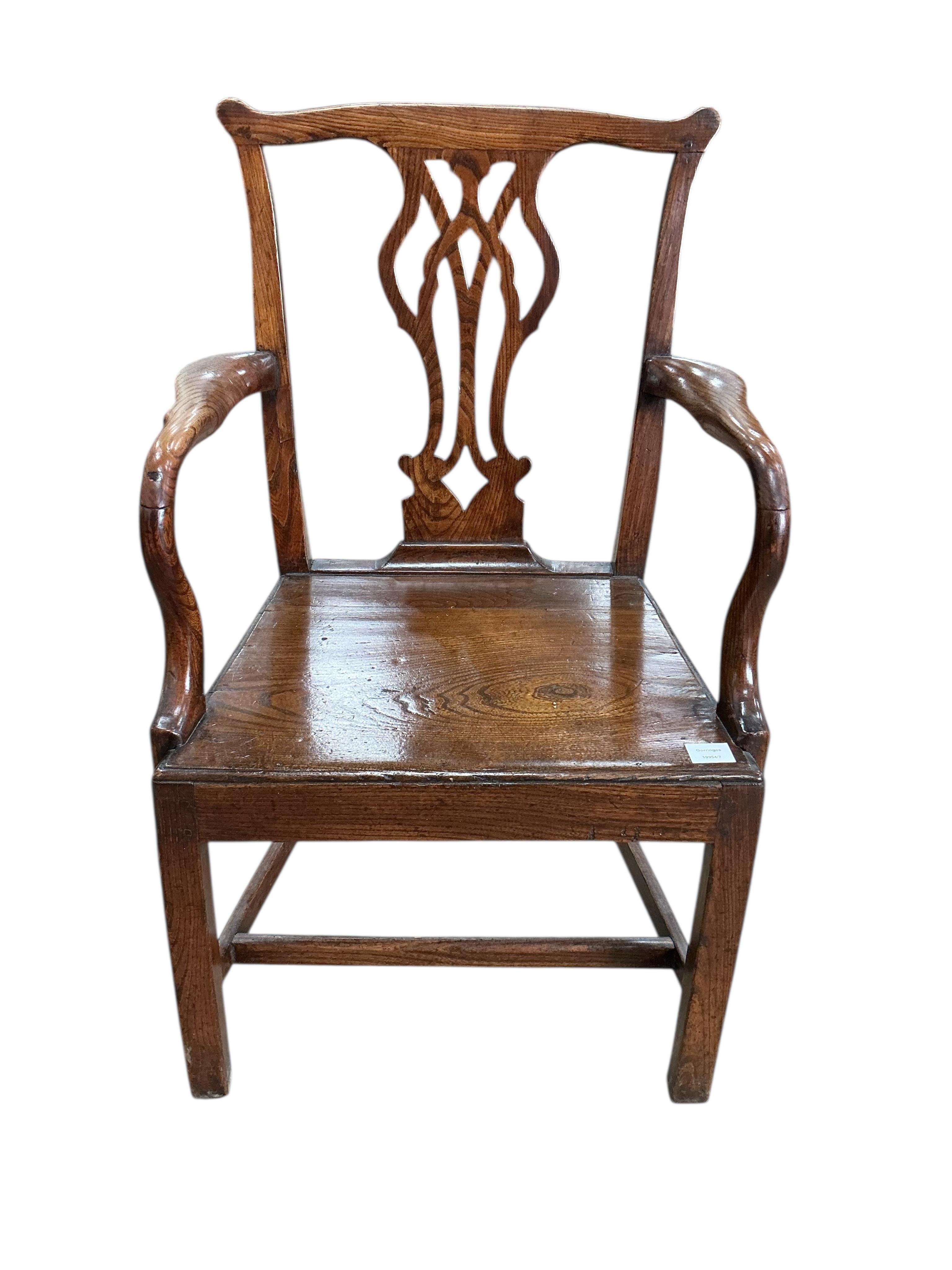 A George III Provincial oak wood seat elbow chair, width 60cm, depth 46cm, height 96cm